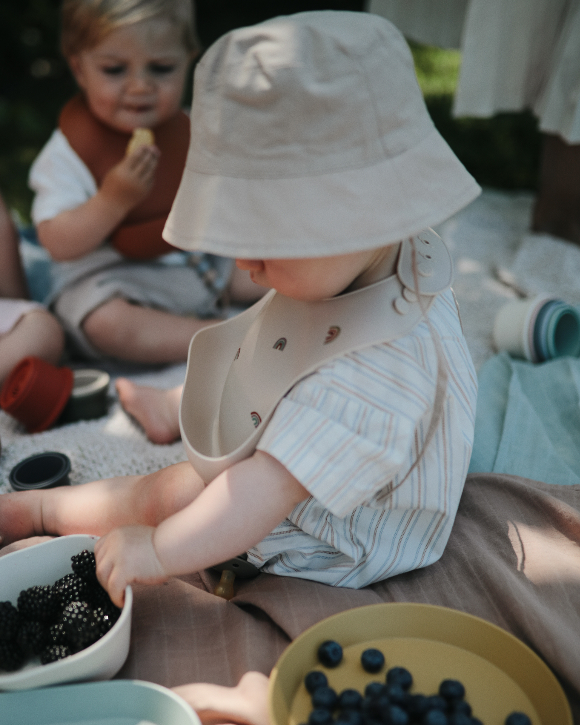 Bavoir en silicone - Arc-en-ciel P'tits Loups Shop